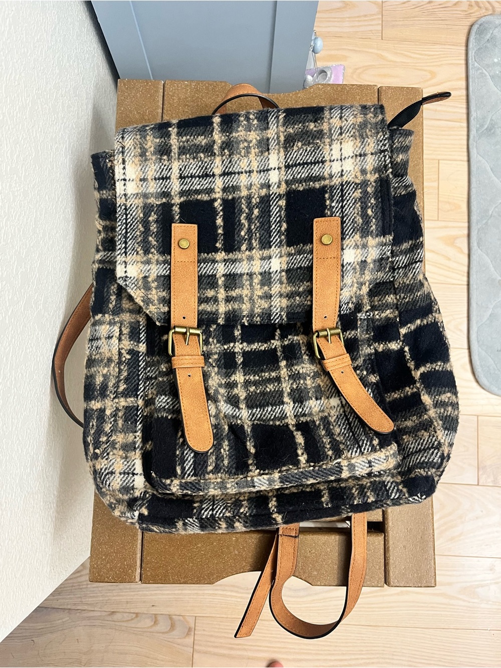 Natural Reflections black and beige plaid backpack